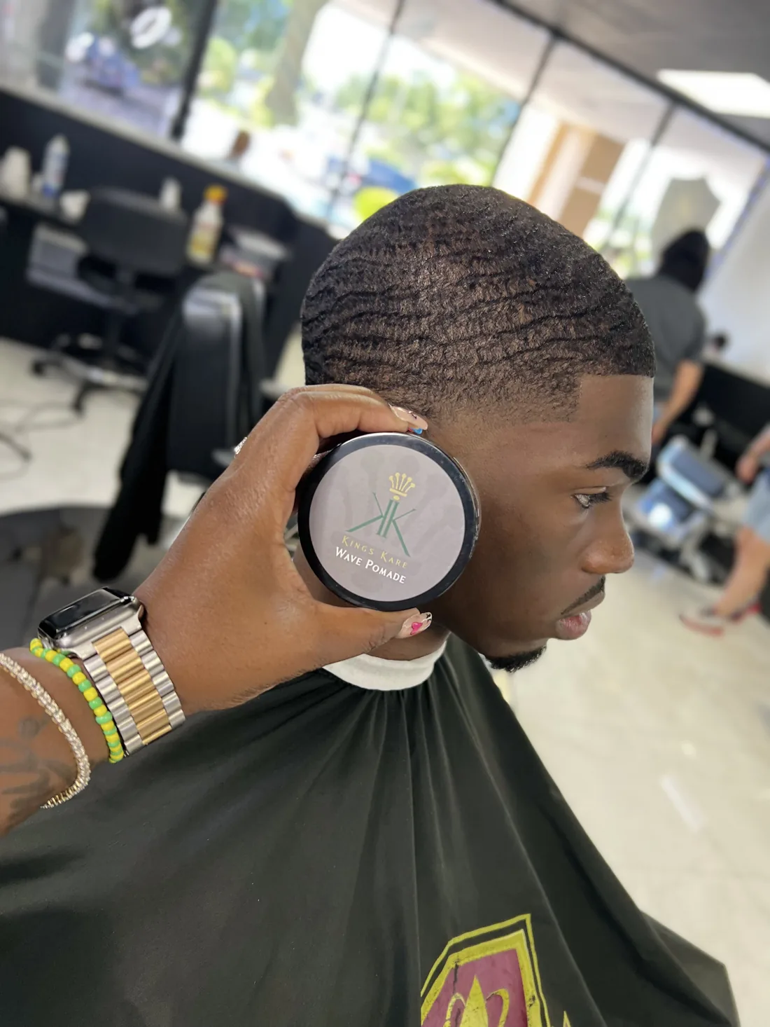 360 waves and clean haircut by a Tampa barber at Kings Kare barbershop