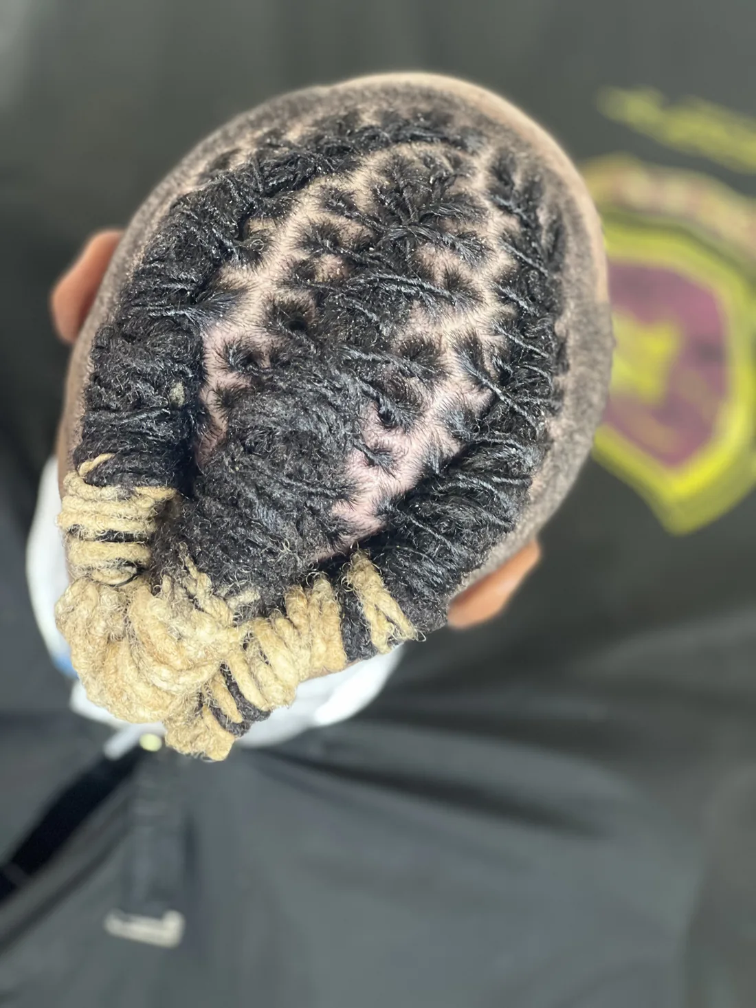 Loc retwist in progress by a Tampa barber at Kings Kare