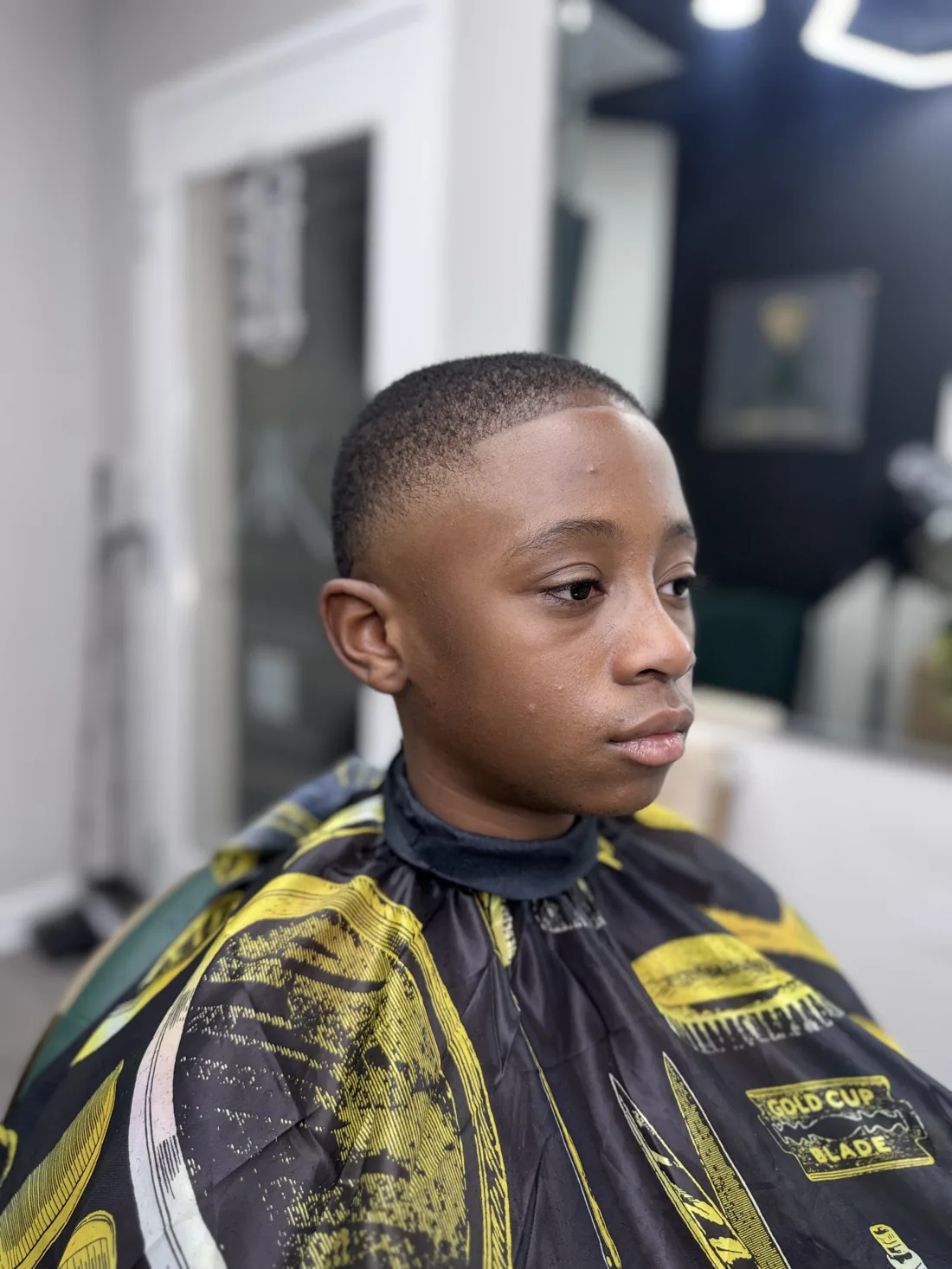 Crisp skin fade by a master Tampa barber