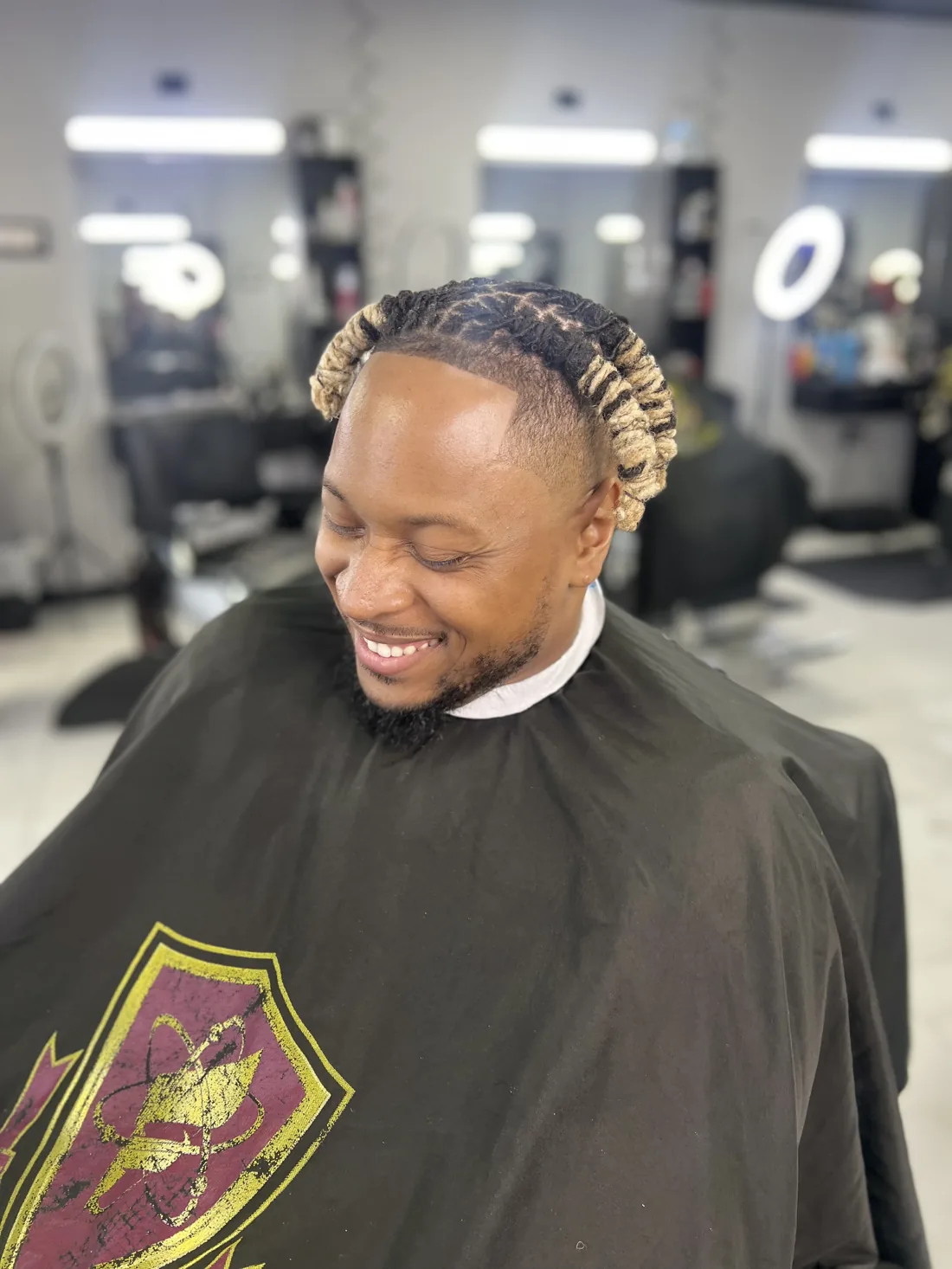 Starter locs and two-strand twists at a Tampa barbershop